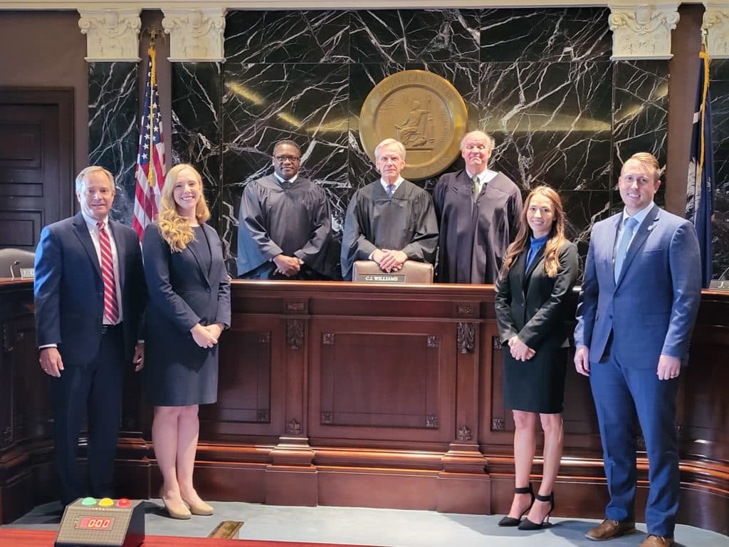 From left to right: Solicitor Duffie Stone; Assistant Solicitor Valerie A. Letko; the Honorable John D. Geathers; Chief Judge H. Bruce Williams; the Honorable D. Garrison D. Hill; Assistant Solicitor Makeia R. Jonese and Assistant Solicitor J.D. Williams.