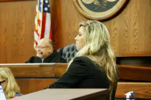Assistant Solicitor Hunter Swanson listens to testimony from defendant John Patrick Shea.