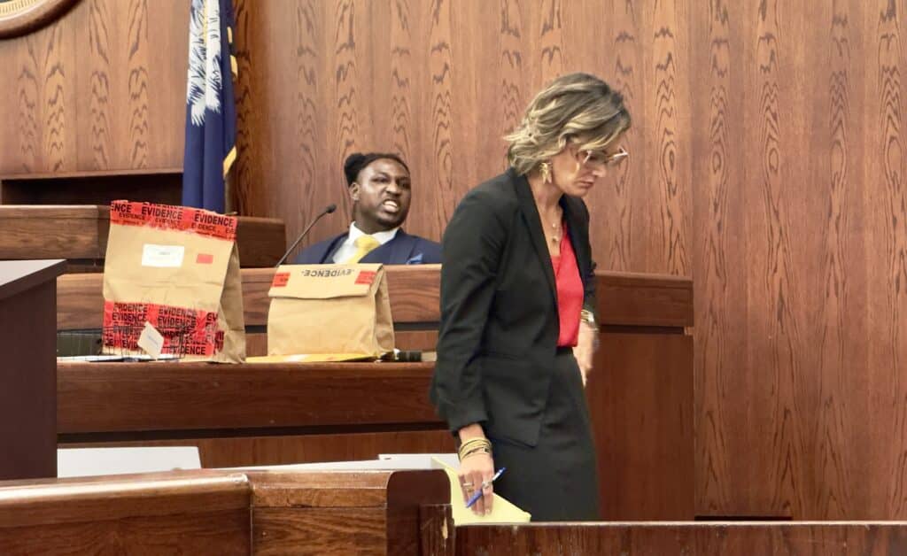 Deputy Solicitor Mary Jones, foreground, evokes an angry reaction from murder defendant Nayquan Gadson.